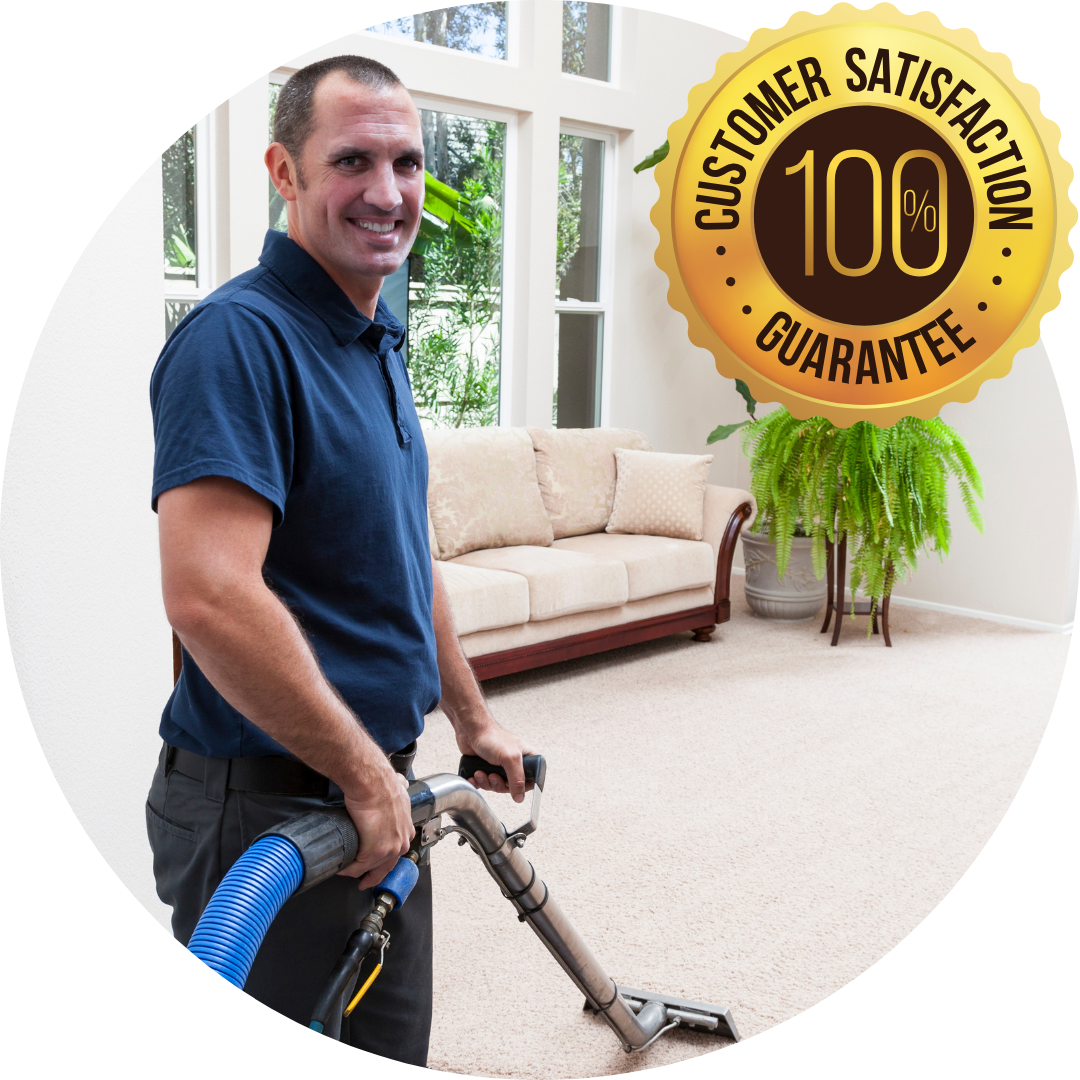 professional carpet cleaner smiling and cleaning carpet