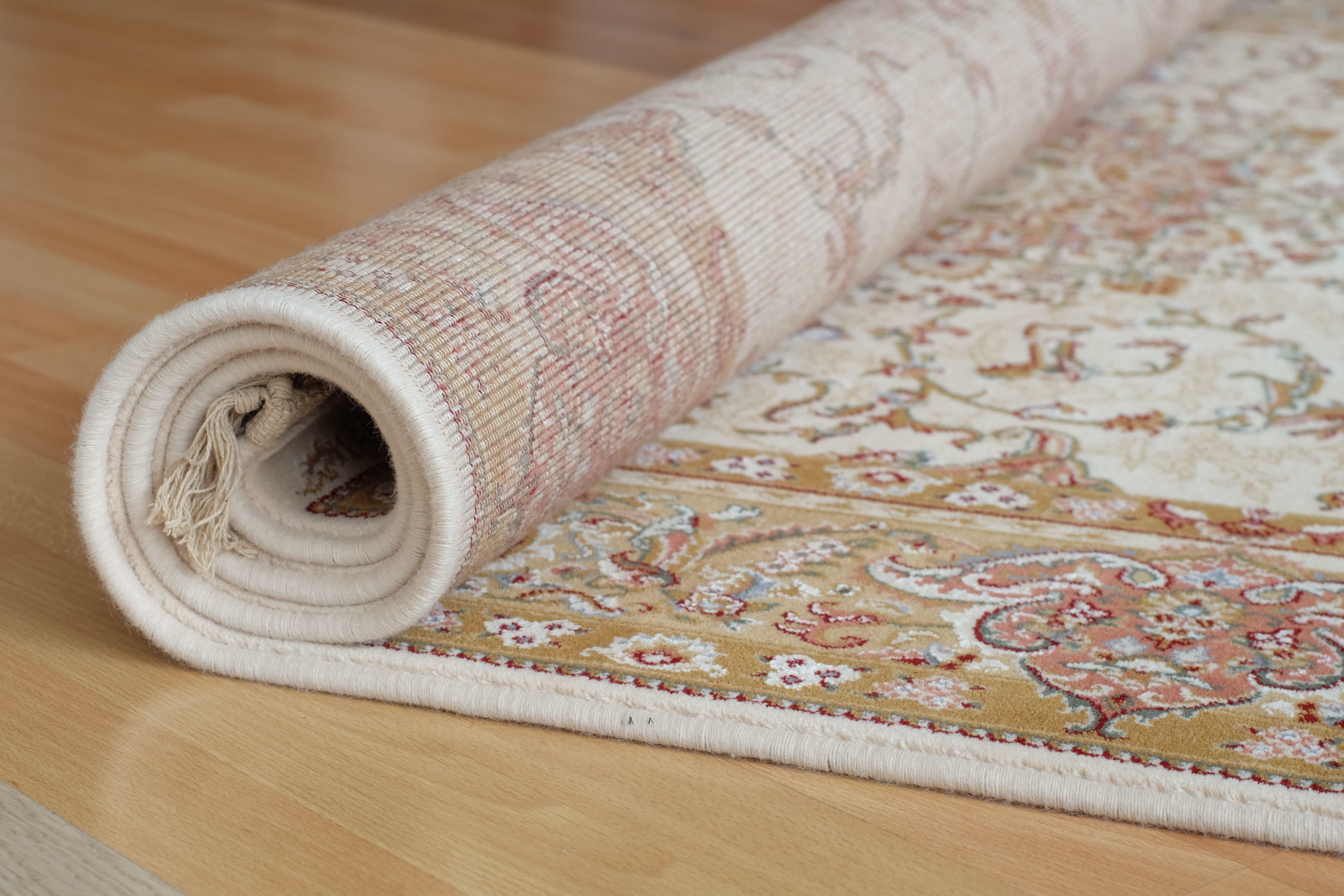 white and light brown area rug